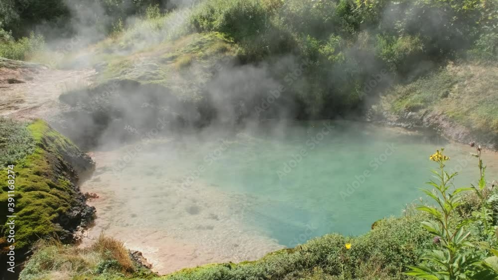 Hot lake in famous Valley of Geysers, Kamchatka peninsula, Russia, 4k