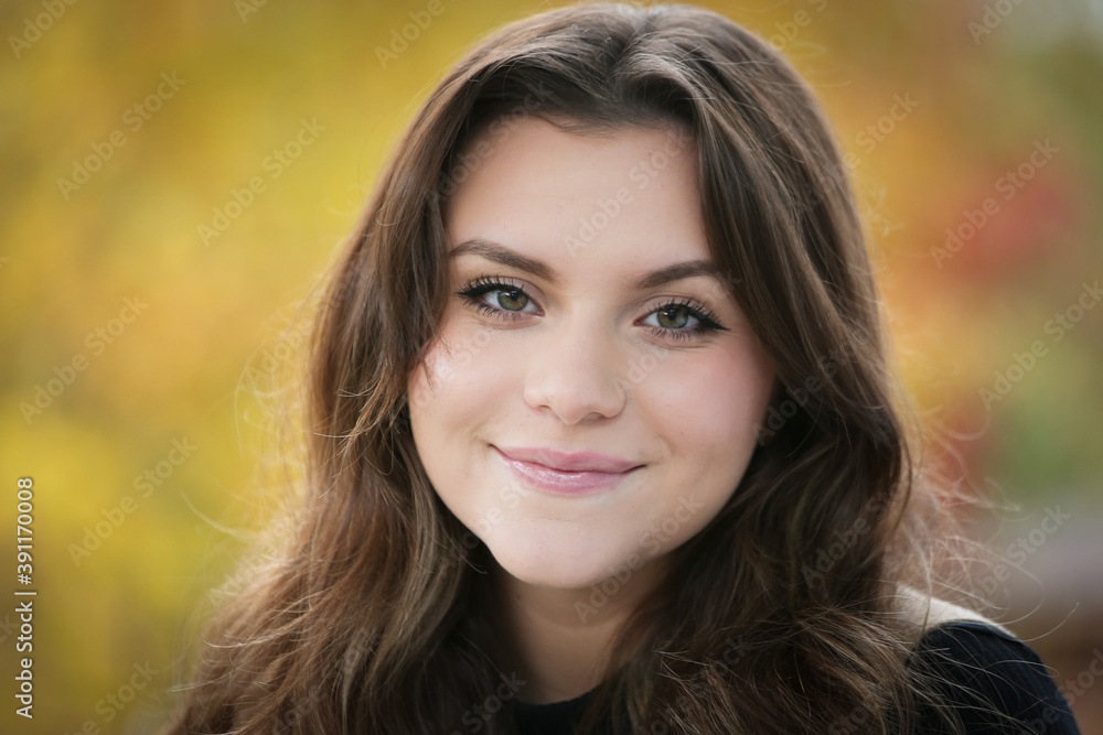 Close up Portrait of 18 Years Old Beautiful, Gorgeous Girl with Long Brown hair and Big eyes, Blurry Fall Background, Happy Teenager Close up Portrait of 18 Years Old Beautiful, Gorgeous Girl with Long Brown hair and Big eyes, Blurry Fall Background, Happy Teenager