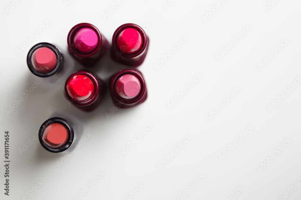 Lipsticks on white background. Top view Lipsticks on white background. Top view