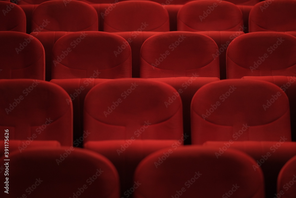 Obraz premium Empty cinema hall with red seats. Movie theatre