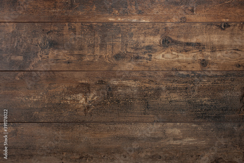 Wooden background. Texture with an old, rustic, brown planks. dark wood texture. background old dark panels