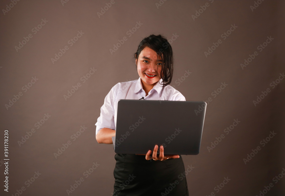 Young woman working on laptop. Young woman working on laptop.