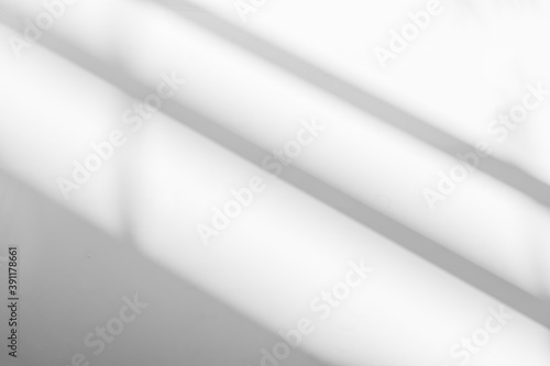 Abstract shadow and striped diagonal light background in office room  on white wall  from window, architecture dark gray and sunshine diagonal geometric effect overlay for backdrop and mockup design