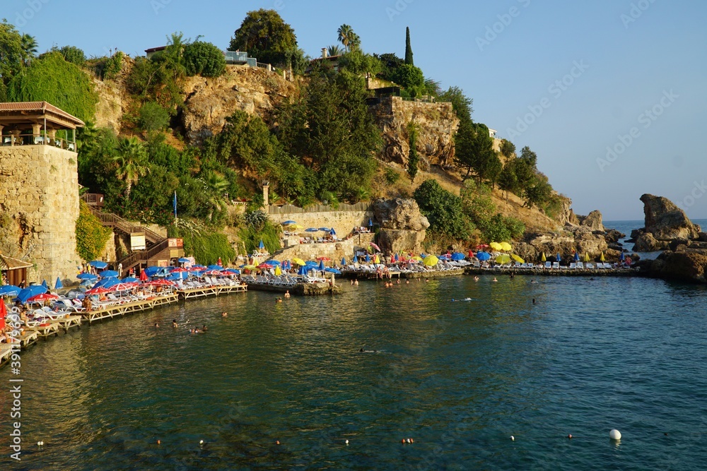 Obraz premium View of Mermerli Beach in historical Kaleici district of Antalya, Turkey.