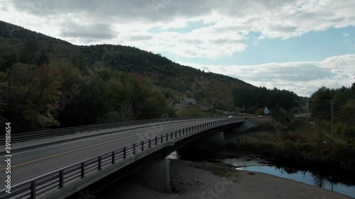 Wallpaper Mural Rising Aerial flying over cars on highway towards mountain foliage, cars below Torontodigital.ca