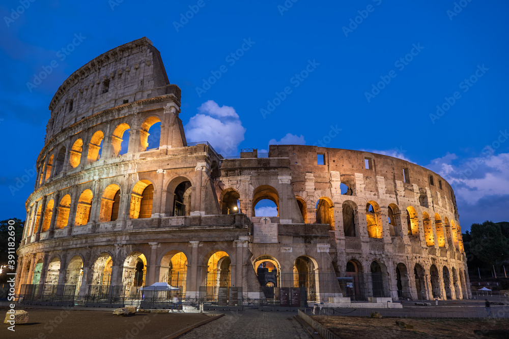 Colosseum Amphitheatre By Night In Rome, Italy