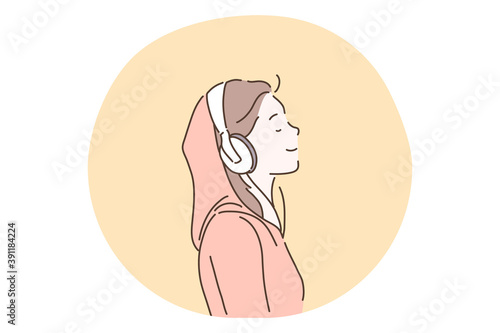 Music lover, sound, headphones, listening and enjoying concept. Young teen girl cartoon character in headphones listening to favourite music, radio or audiobook and smiling, side view 