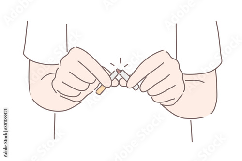 Stop smoking concept. Hands or man smoker holding and cutting cigarette to prevent smoking. Healthy lifestyle, bad habit, cancer, nicotine, addiction concept 