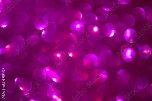 Pink lights blurred out of focus, festive bokeh background