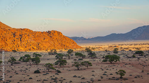 Semi desert landscape at sunrise in the Tiras mountains in south Namibia