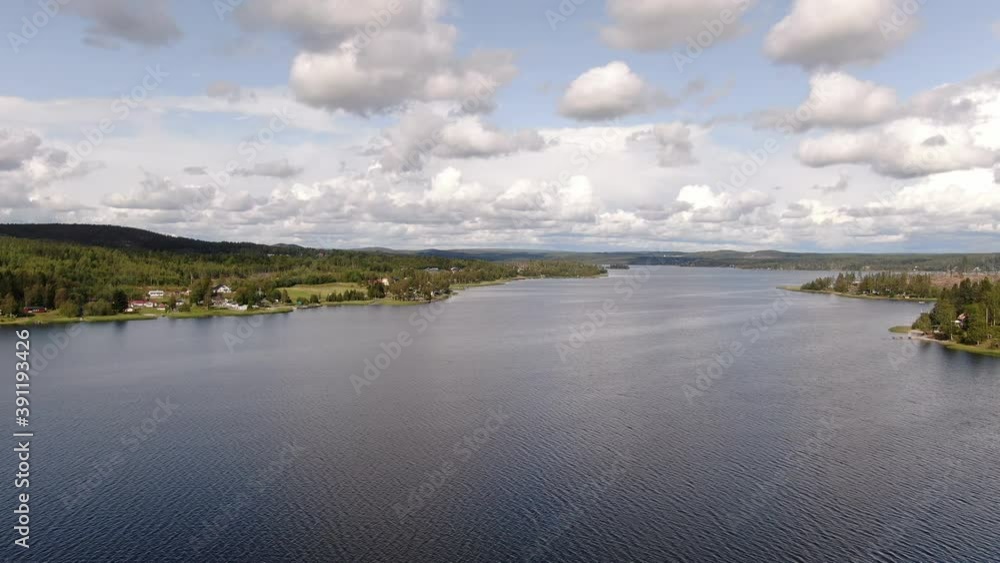 Scenic view over a lake in Örnsköldsvik, Sweden. Aerial trucking shot Scenic view over a lake in Örnsköldsvik, Sweden. Aerial trucking shot