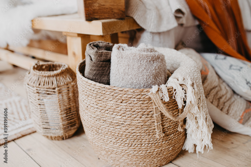 Obraz premium Selective focus on home decor. Comfortable bedroom in bohemian interior style