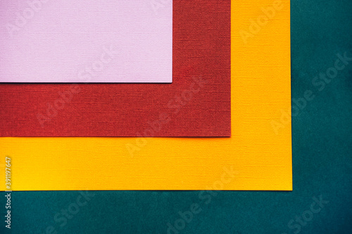 Abstract square background.Dark green, yellow and terracotta.