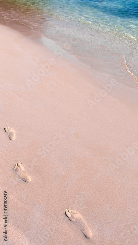 footprints on the beach