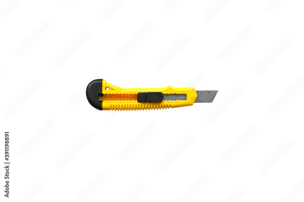 Yellow office knife isolated on white background. Yellow office knife isolated on white background.