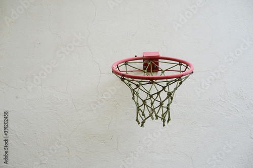 Basketball hoop  with net on the wall outdoor © snowyns