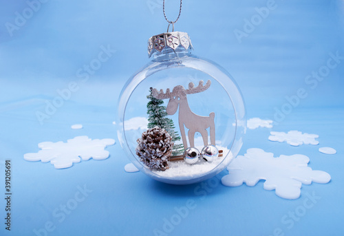 Christmas ornament on abstract blues background. Winter set photo