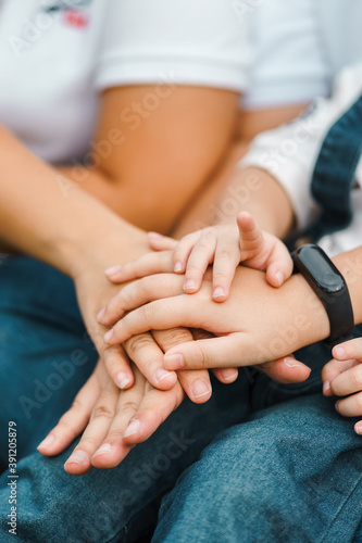 group of people holding hands together