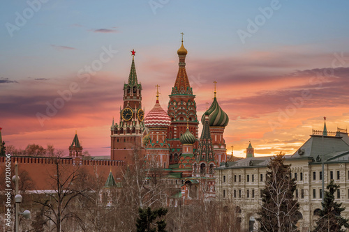 The Moscow Kremlin and St. Basil Cathedral in front of colorful sunset. View from Zaryadye Park