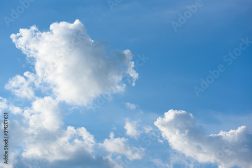 Soft white clouds fluffy in the clear sky