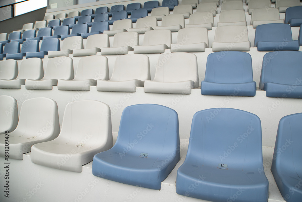 Fototapeta premium empty chairs at the pandemic football stadium in the world. coronavirus. there are no people.