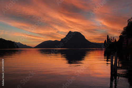 Fired Sunset on Monte San Salvatore with a view of Lugano in Switzerland
