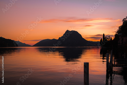 Fired Sunset on Monte San Salvatore with a view of Lugano in Switzerland