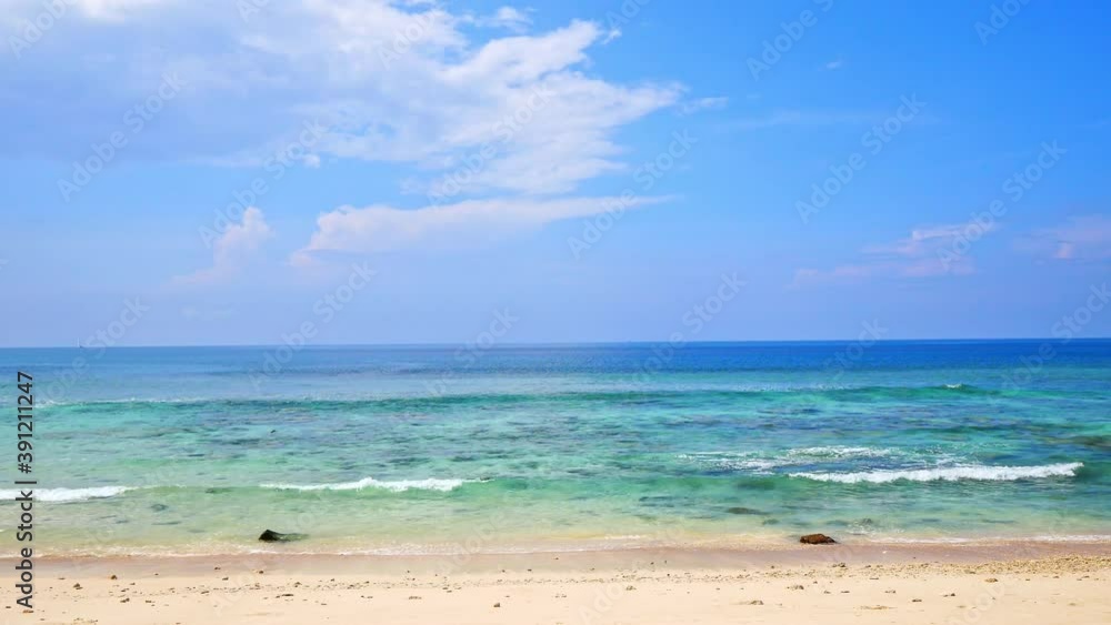 Tropical beautiful landscape of sea ocean around sand with white cloud blue sky for nature background
Tropical beautiful landscape of sea ocean around sand with white cloud blue sky for nature background