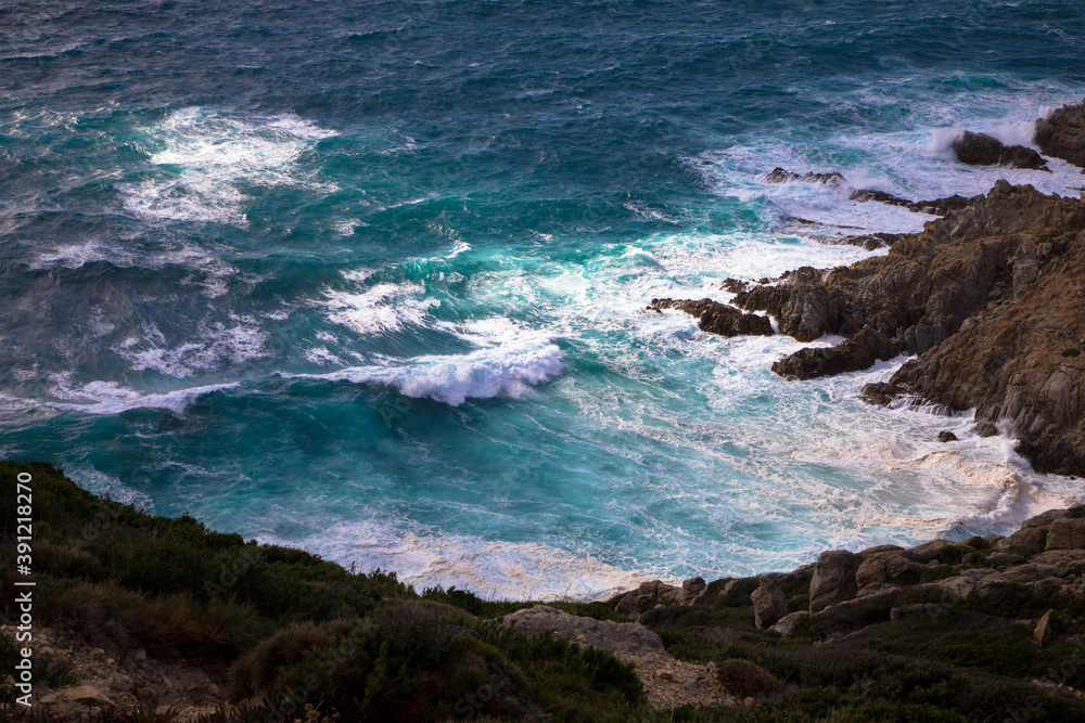 Storm waves crash on the rocky coast. Cap Corse, Corsica, France. Storm waves crash on the rocky coast. Cap Corse, Corsica, France.