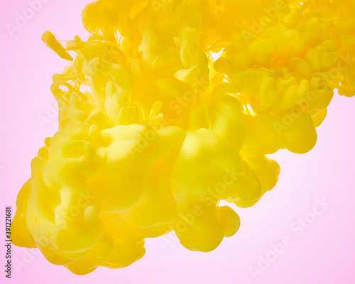 Yellow ink drop in water