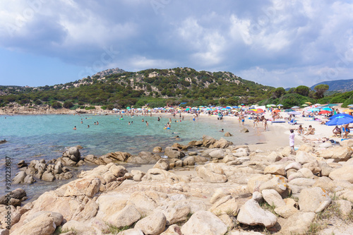 CHIA, SARDINIA, ITALY - SEPTEMBER 3, 2019: Cala Cipolla beach with clear turquoise water near Chia, Sardinia island, Italy © salarko
