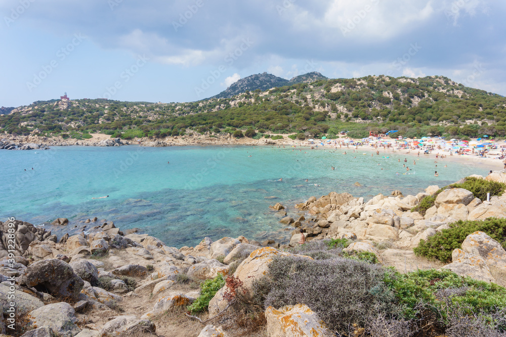 CHIA, SARDINIA, ITALY - SEPTEMBER 3, 2019: Cala Cipolla beach with clear turquoise water near Chia, Sardinia island, Italy