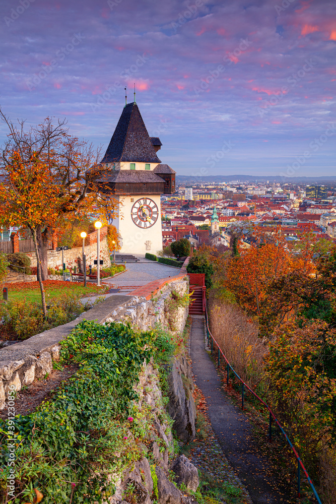 Graz, Austria. Cityscape image of the Graz, Austria with the Clock Tower at beautiful autumn sunset.