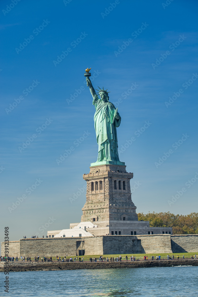Sky colors on the background of Statue of Liberty, New York City