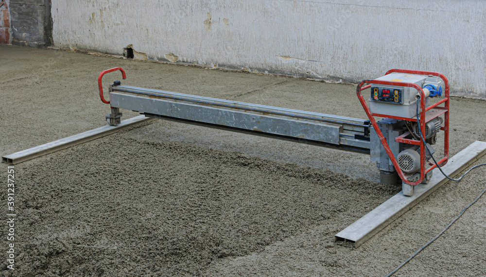 Employee performs sand and cement screed floor. Sand and cement floor ...