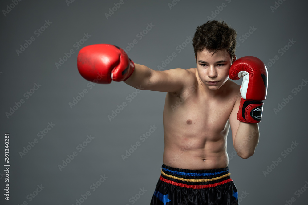 Teenage boxer with red gloves Teenage boxer with red gloves