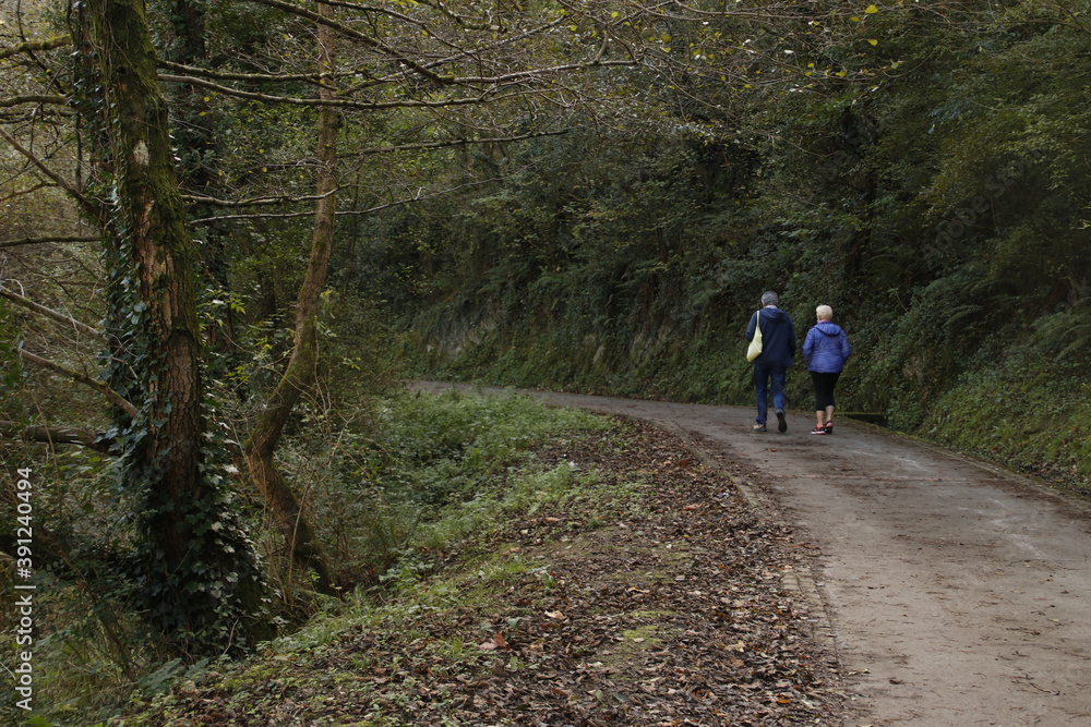 Couple hiking in the countryside Couple hiking in the countryside