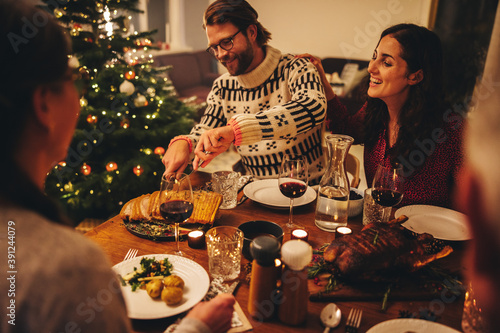 European family having christmas dinner photo