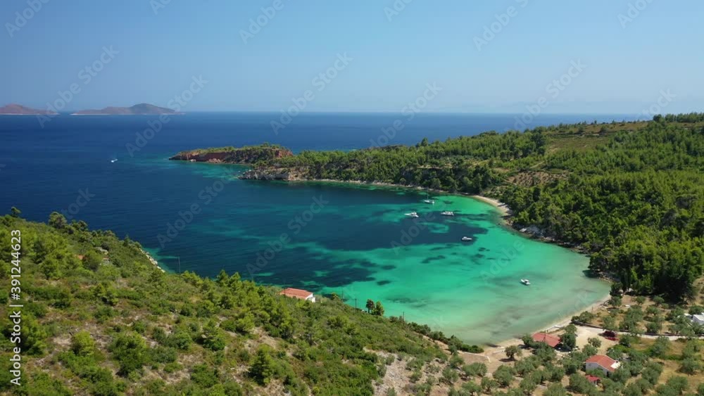 Aerial drone video of paradise beach of Tzortzi gialos with crystal clear turquoise sea, Alonissos island, Sporades, Greece Aerial drone video of paradise beach of Tzortzi gialos with crystal clear turquoise sea, Alonissos island, Sporades, Greece