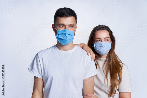 Young couple wearing medicine masks