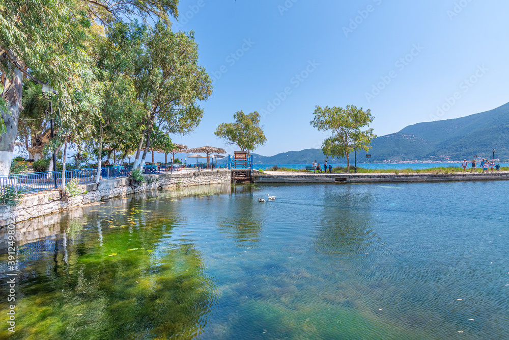 View of Karavomilos natura lake with calm waters in Kefalonia Greece