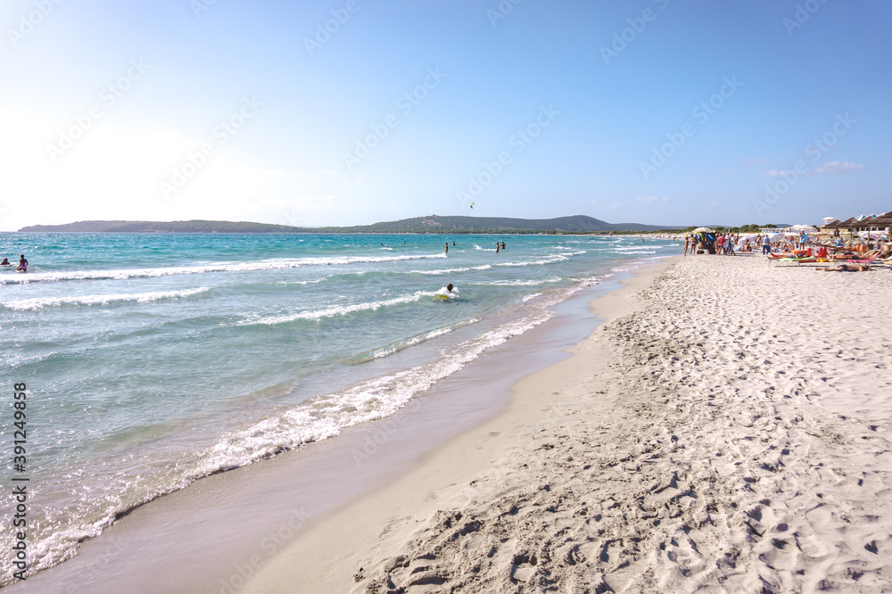 Obraz premium PORTO PINO, SARDINIA, ITALY - SEPTEMBER 6, 2019: Porto Pino beautiful sandy beach in Sant'Anna Arresi, south Sardinia, Italy