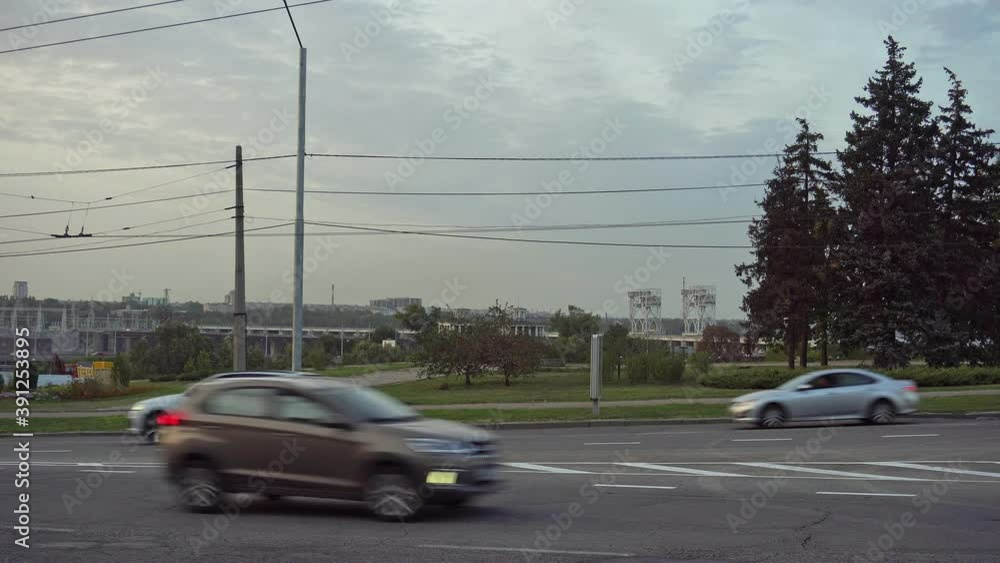 cars pass on the road against the sky cars pass on the road against the sky