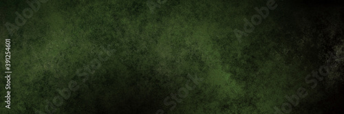 Grunge green grain background, distressed vintage textured cloudy design, framed Christmas or St Patrick's day banner