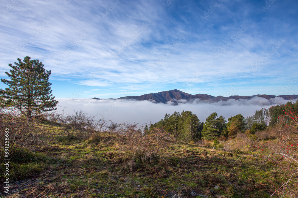 Autumn mountain landscape with low clouds, province of Genoa, Ligurian Alps, Italy. Autumn mountain landscape with low clouds, province of Genoa, Ligurian Alps, Italy.