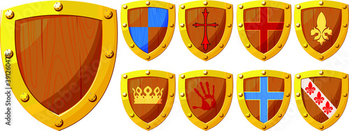 A small set of wooden knight shields forged with iron with various heraldic emblems