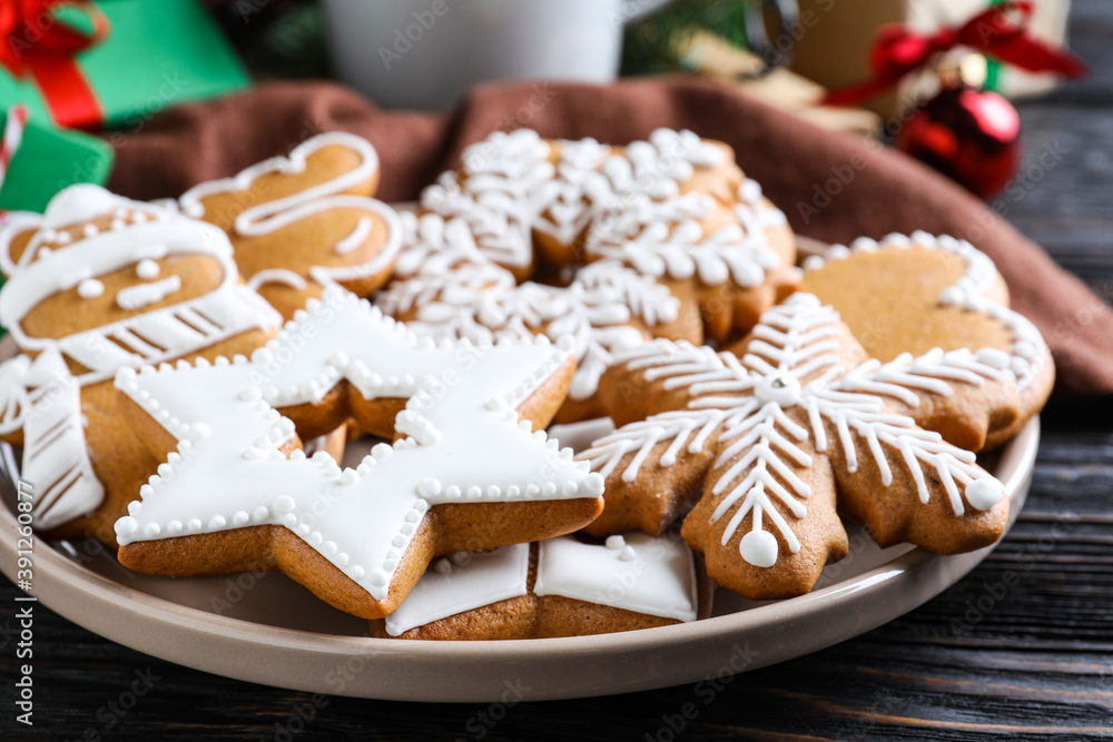 Delicious Christmas cookies on black wooden table table, closeup Delicious Christmas cookies on black wooden table table, closeup