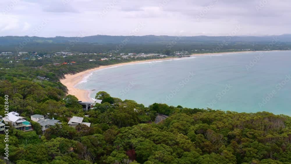 The Wonderful Green Lush Island In Byron Bay, Australia With White Sand and Turquoise Water - Aerial Shot The Wonderful Green Lush Island In Byron Bay, Australia With White Sand and Turquoise Water - Aerial Shot