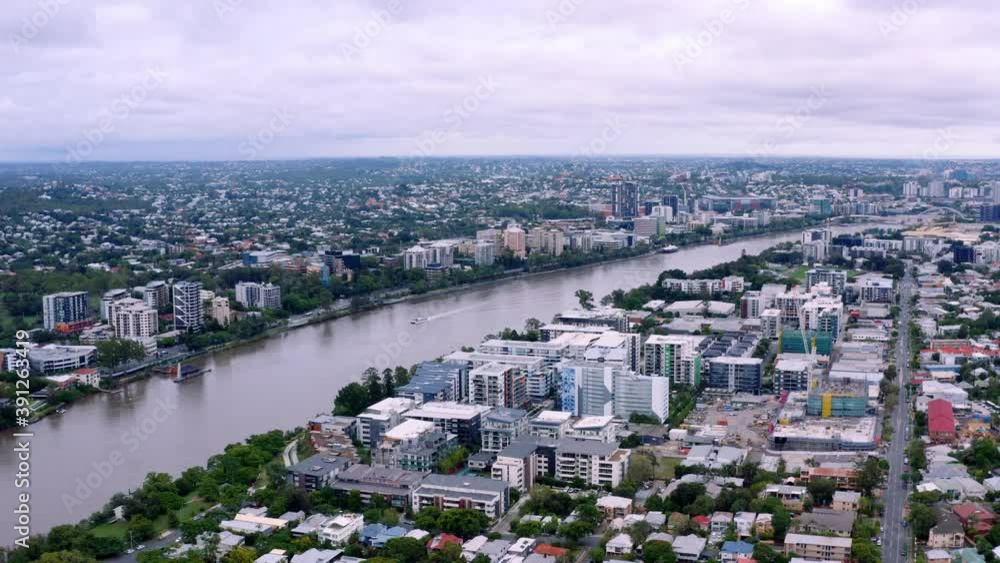 The Beautiful and Peaceful City Of Brisbane in Australia With Different Buildings and Calm Lake - Aerial Shot The Beautiful and Peaceful City Of Brisbane in Australia With Different Buildings and Calm Lake - Aerial Shot