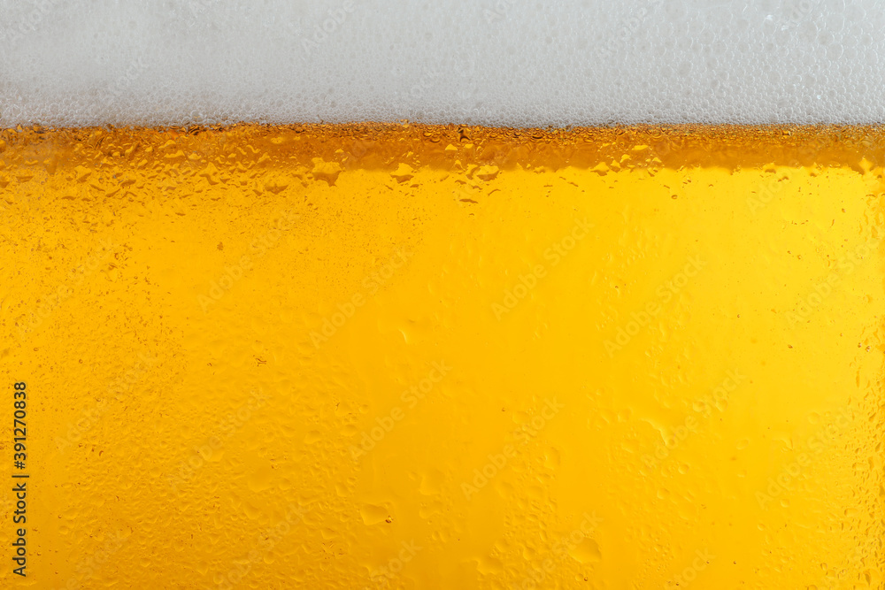 Glass of tasty beer with foam, closeup Glass of tasty beer with foam, closeup
